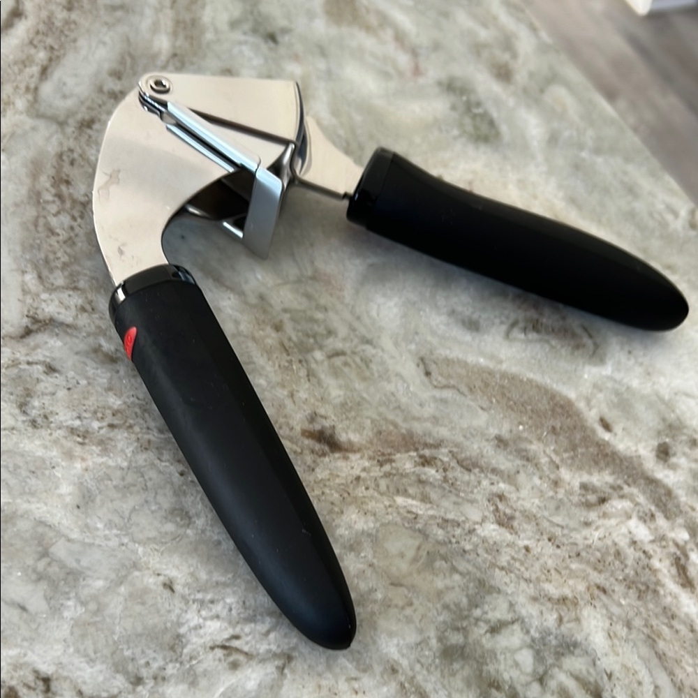 Black and Silver Garlic Press